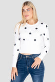 Suéter con estampado de lunares cuello redondo