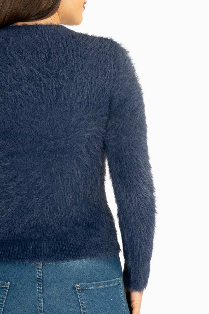 Suéter peluche con cierre