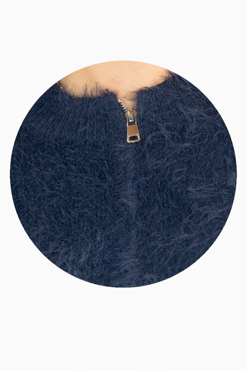 Suéter peluche con cierre