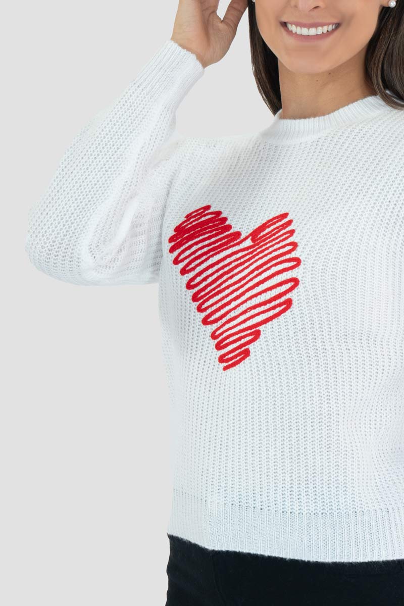 Suéter con estampado de corazón y cuello alto