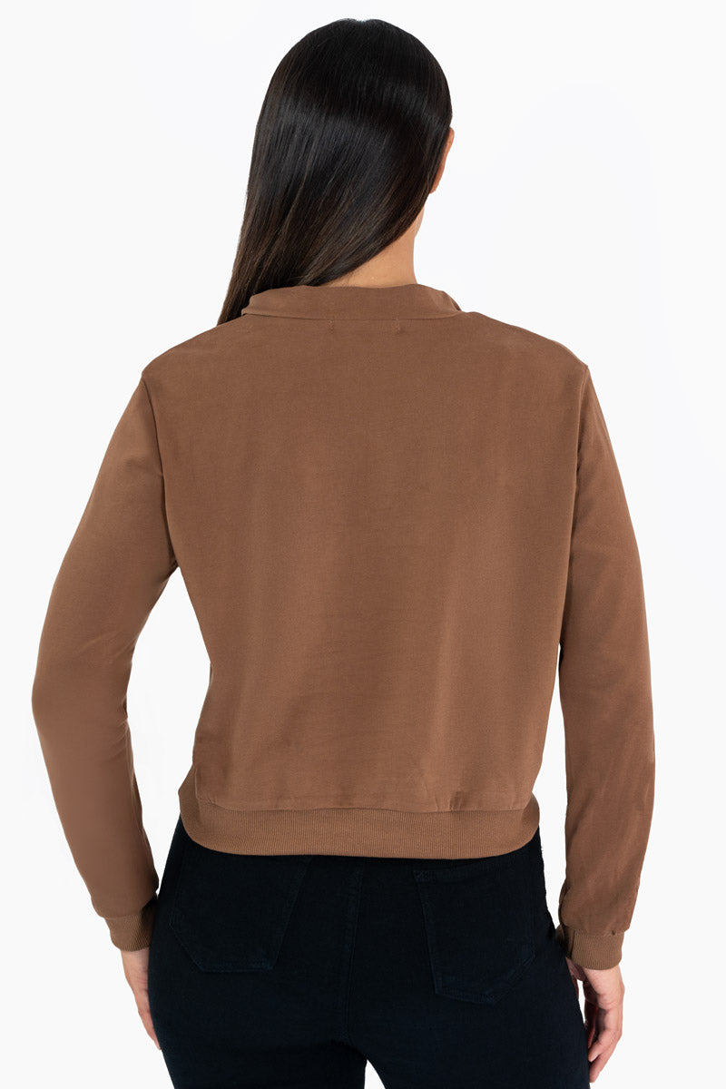 Sudadera con cierre y estampado en pecho