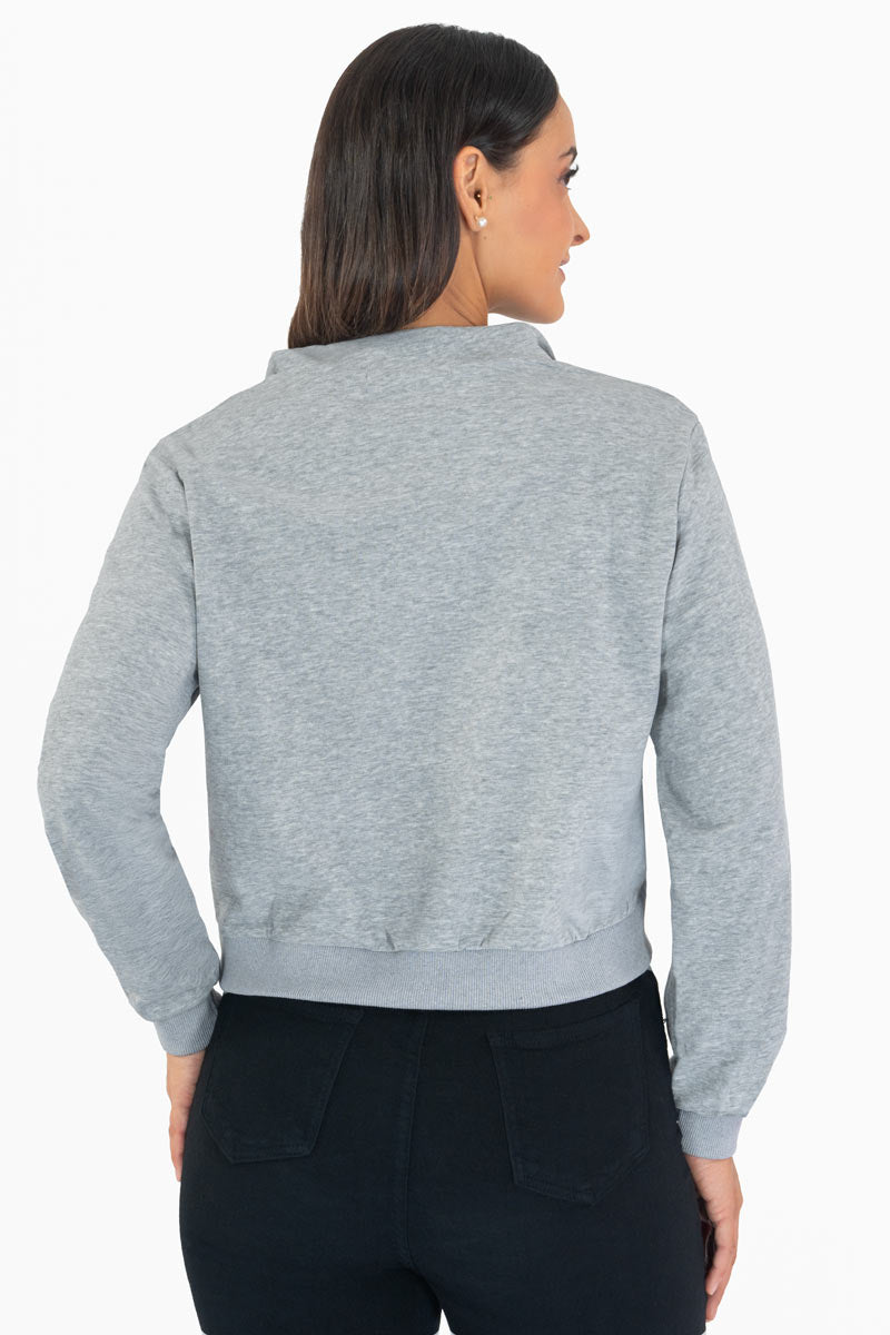 Sudadera con cierre y estampado en pecho