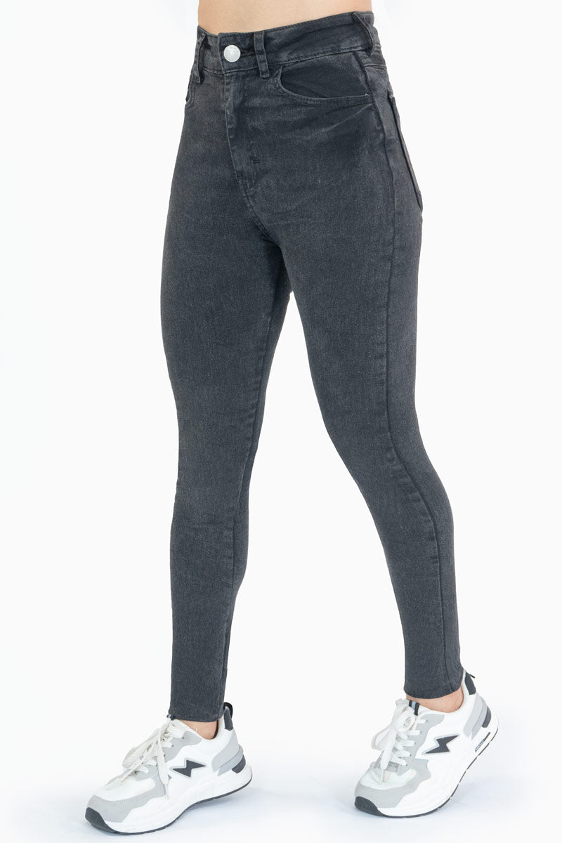 Jeans skinny tiro alto con bolsas