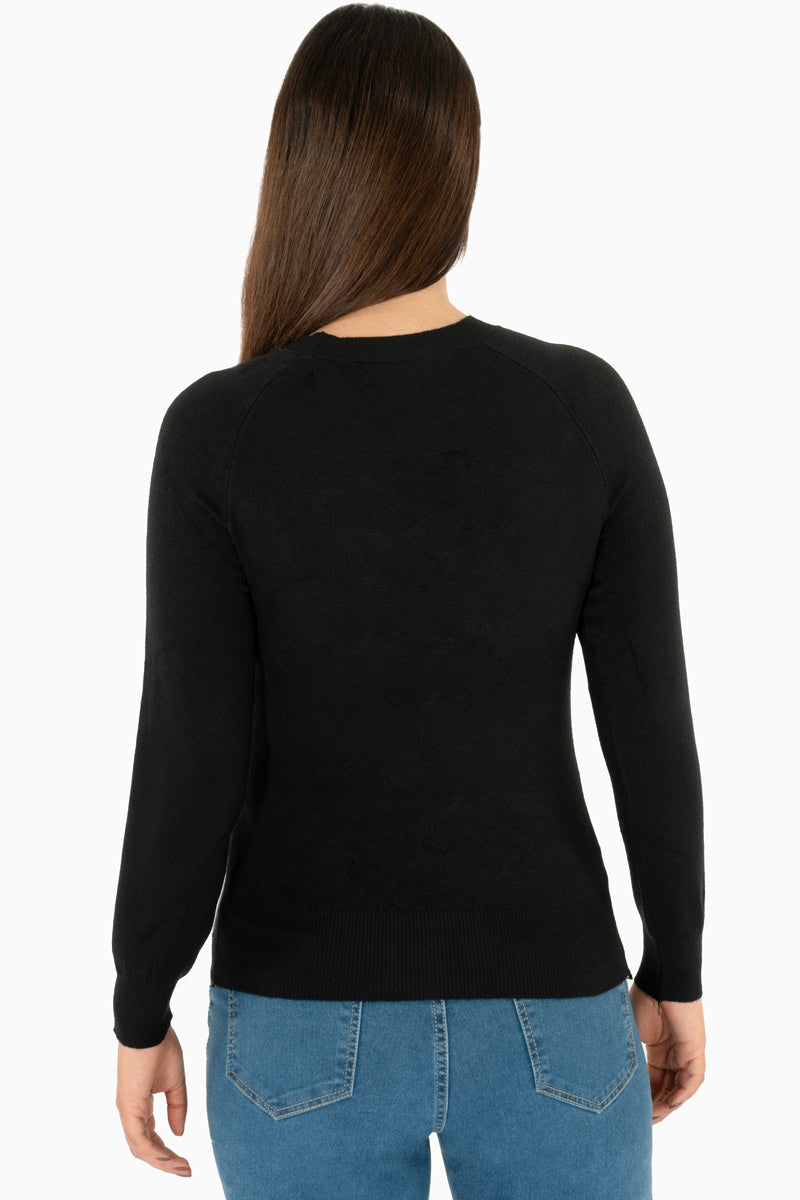 Suéter con detalle de piedras en hombros