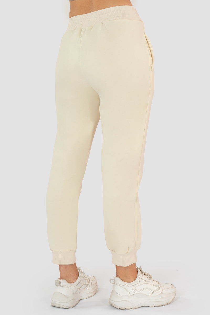 Pans tipo jogger con jareta y bolsas