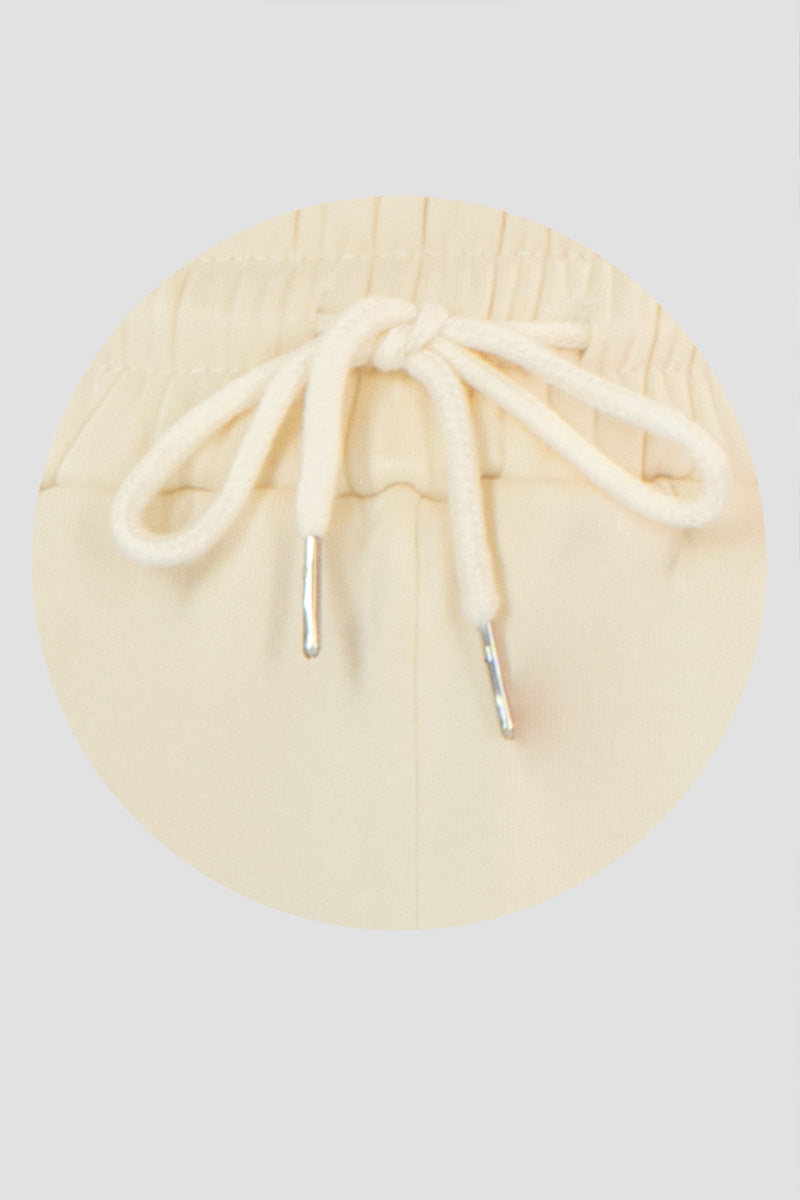 Pans tipo jogger con jareta y bolsas